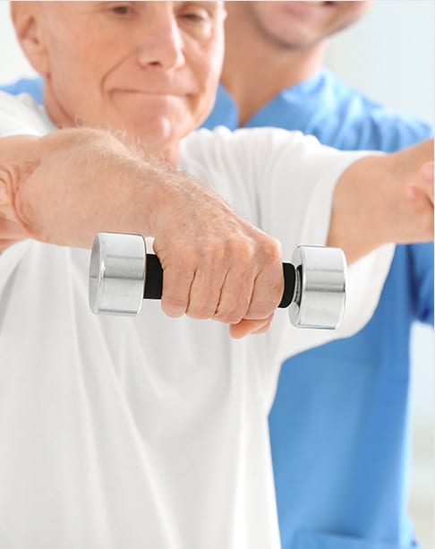 elderly man lifting small weights outfront of chest